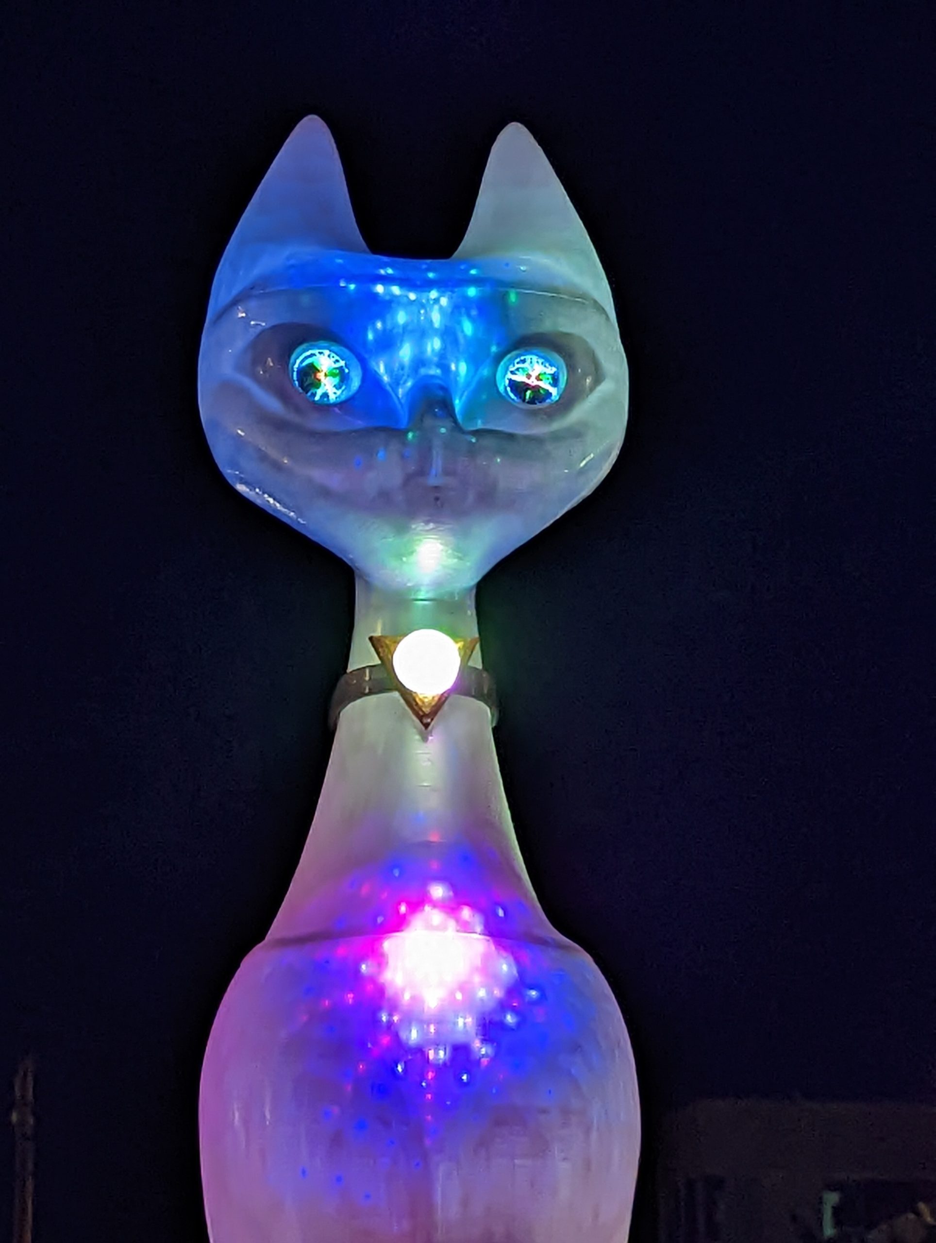 A Catolith, lit at night